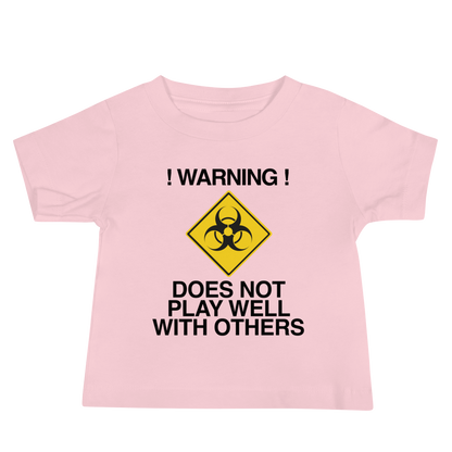 "!Warning! Does Not Play Well With Others" printed on a pink baby jersey short sleeve tee laying on a flat surface