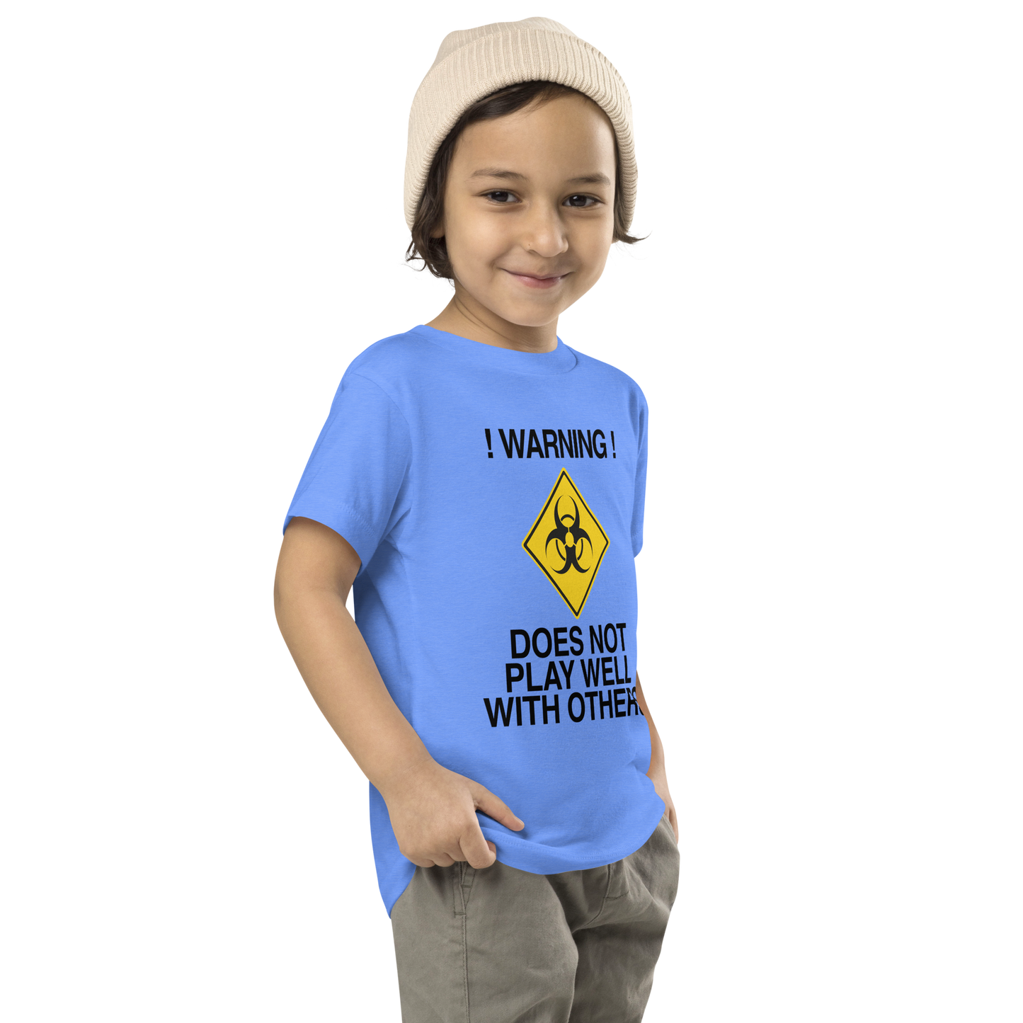 "!Warning! Does Not Play Well With Others" printed on a heather columbia blue toddler short sleeve tee worn by a male who is also wearing a knit cap