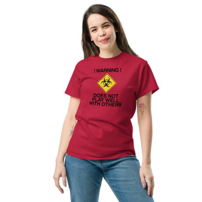 "!Warning! Does Not Play Well With Others" printed on a cardinal unisex classic tee worn by a female