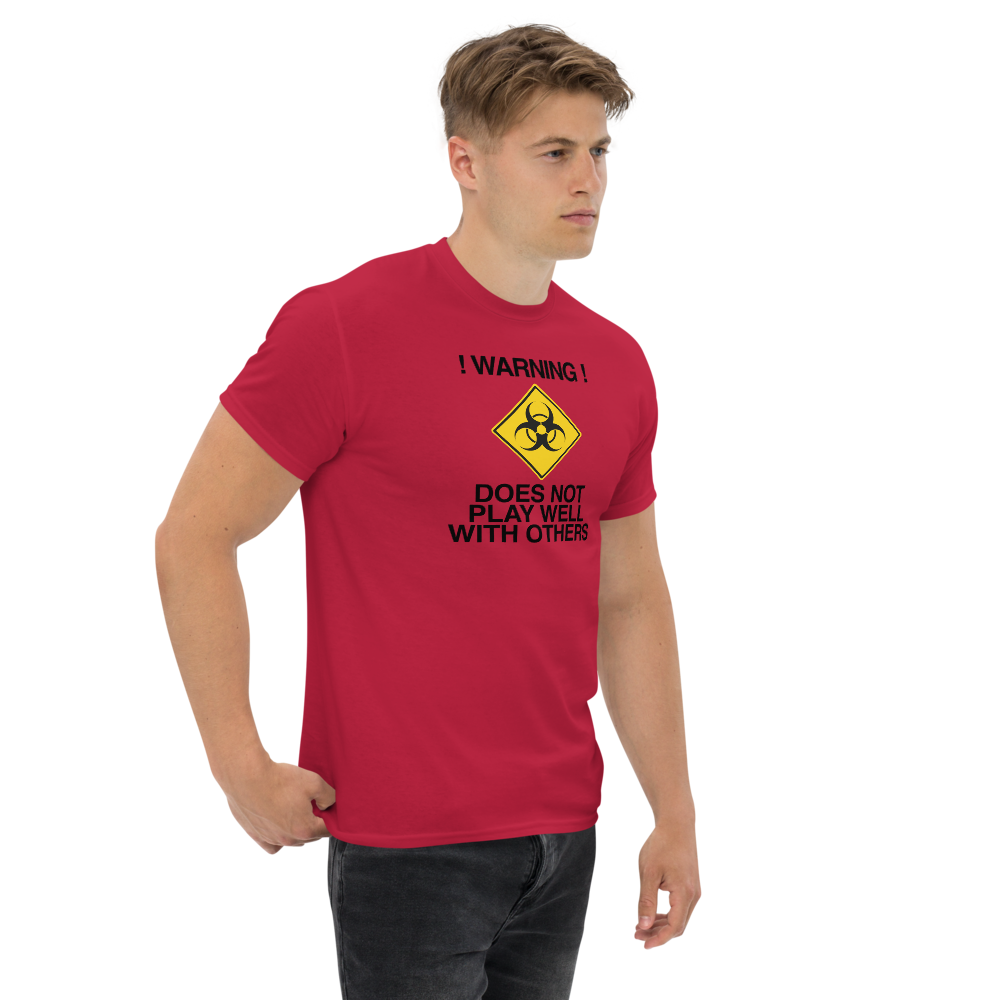 "!Warning! Does Not Play Well With Others" printed on a cardinal unisex classic tee worn by a male