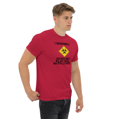 "!Warning! Does Not Play Well With Others" printed on a cardinal unisex classic tee worn by a male