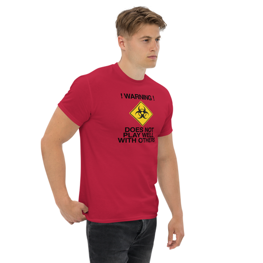 "!Warning! Does Not Play Well With Others" printed on a cardinal unisex classic tee worn by a male