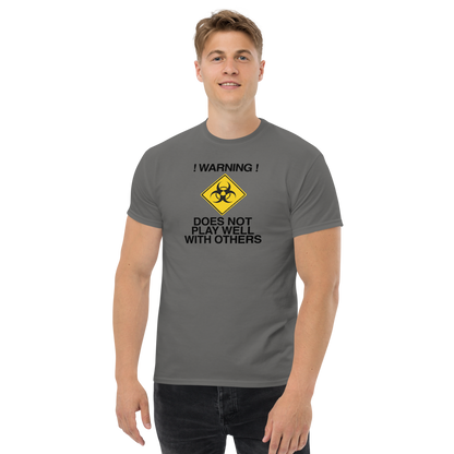 "!Warning! Does Not Play Well With Others" printed on a charcoal unisex classic tee worn by a male