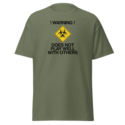 "!Warning! Does Not Play Well With Others" printed on a military green on an invisible body