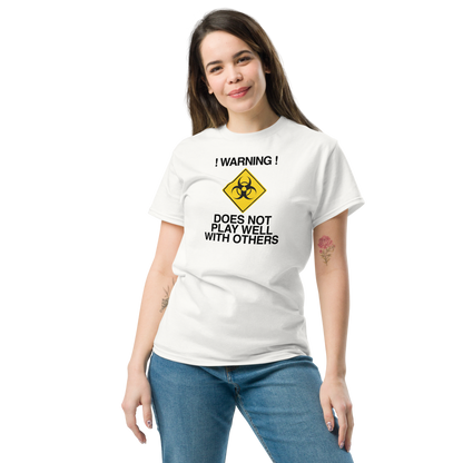 "!Warning! Does Not Play Well With Others" printed on a white unisex classic tee worn by a female