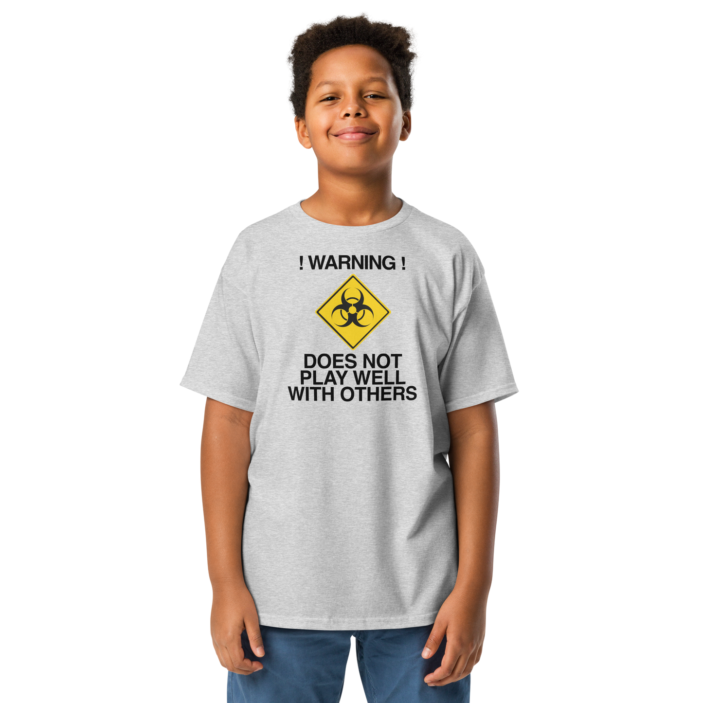 "!Warning! Does Not Play Well With Others" printed on a sport grey youth classic tee worn by a male