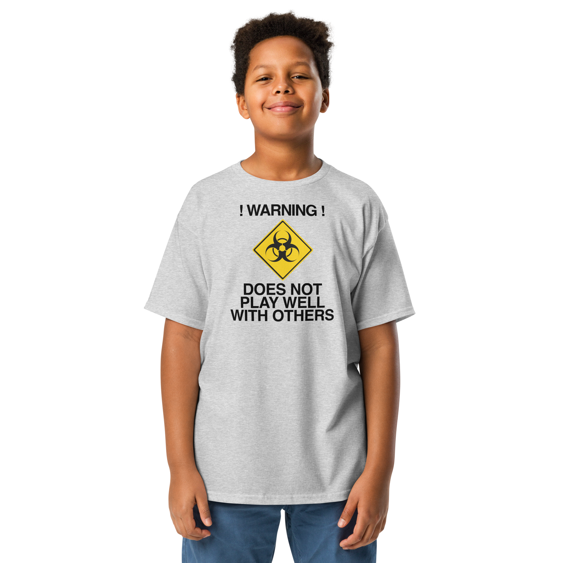 "!Warning! Does Not Play Well With Others" printed on a sport grey youth classic tee worn by a male