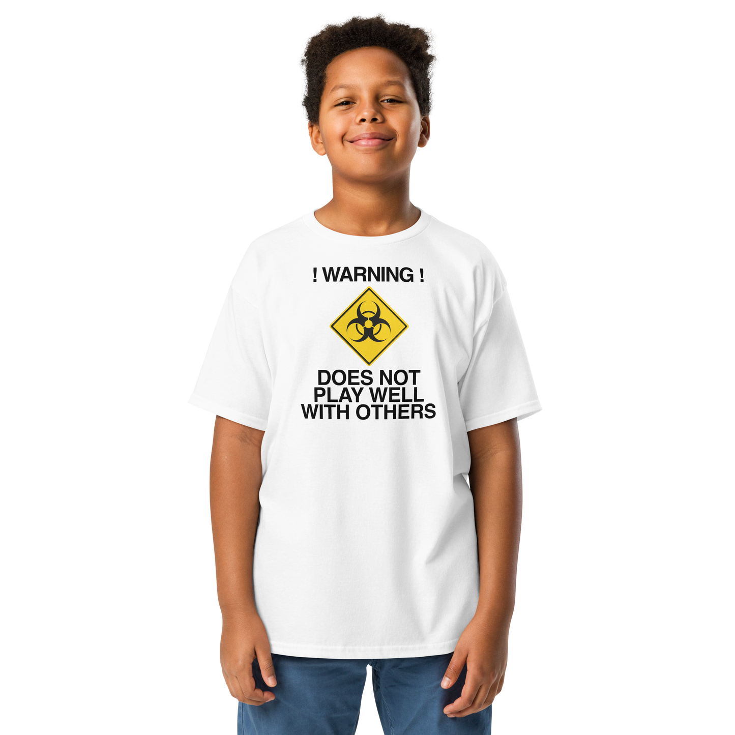 "!Warning! Does Not Play Well With Others" printed on a white youth classic tee worn by a male