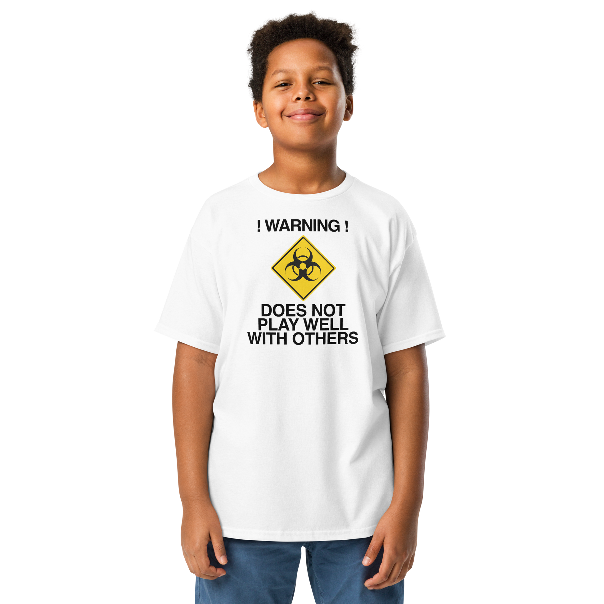 "!Warning! Does Not Play Well With Others" printed on a white youth classic tee worn by a male