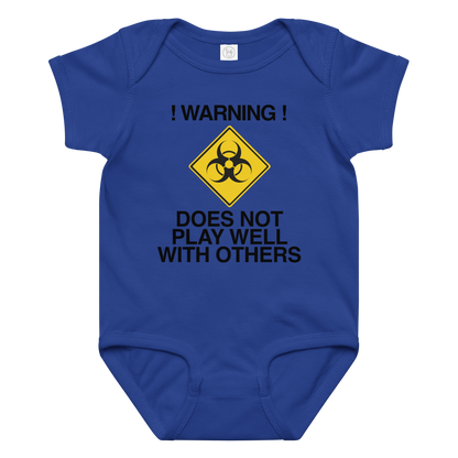 "!Warning! Does Not Play Well With Others" printed on a royal baby jersey bodysuit laying on a flat surface amongst other clothes