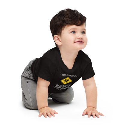 "!Warning! Does Not Play Well With Others" printed on a black baby jersey short sleeve tee worn by a male who is crawling
