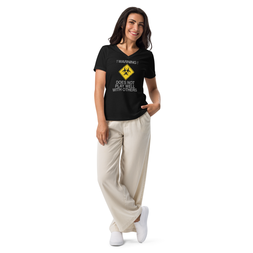 "!Warning! Does Not Play Well With Others" printed on a solid black blend women's relaxed v-neck t-shirt worn by a female