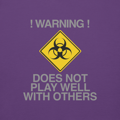 "!Warning! Does Not Play Well With Others" printed on a purple background