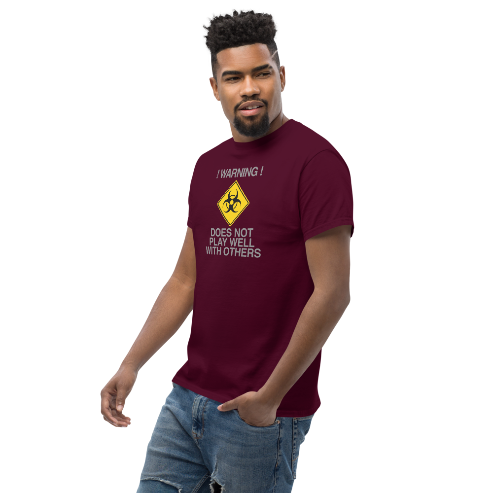 "!Warning! Does Not Play Well With Others" printed on a maroon unisex classic tee worn by a male