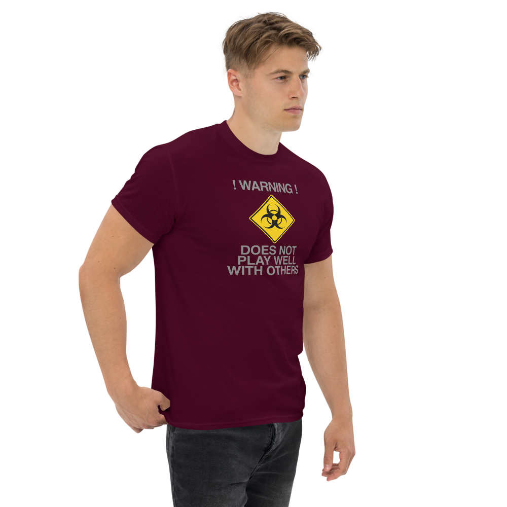 "!Warning! Does Not Play Well With Others" printed on a maroon unisex classic tee worn by a male