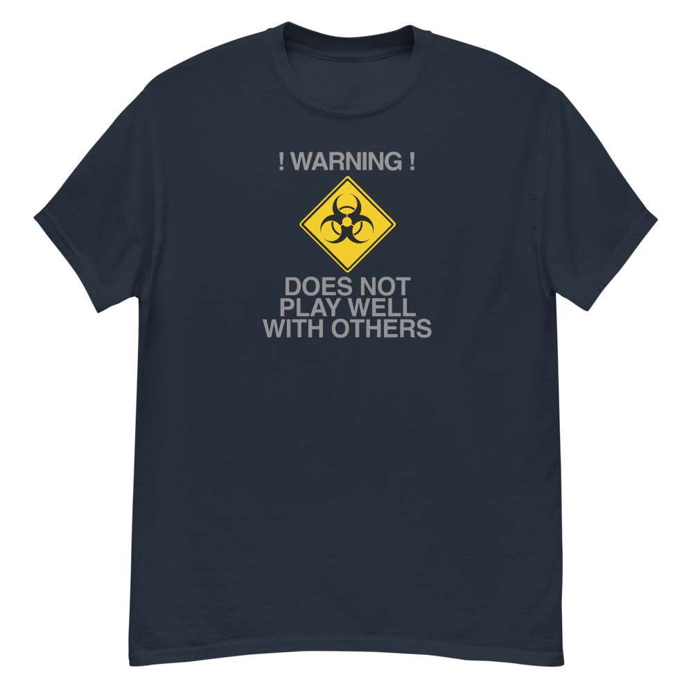 "!Warning! Does Not Play Well With Others" printed on a navy unisex classic tee laying on a flat surface