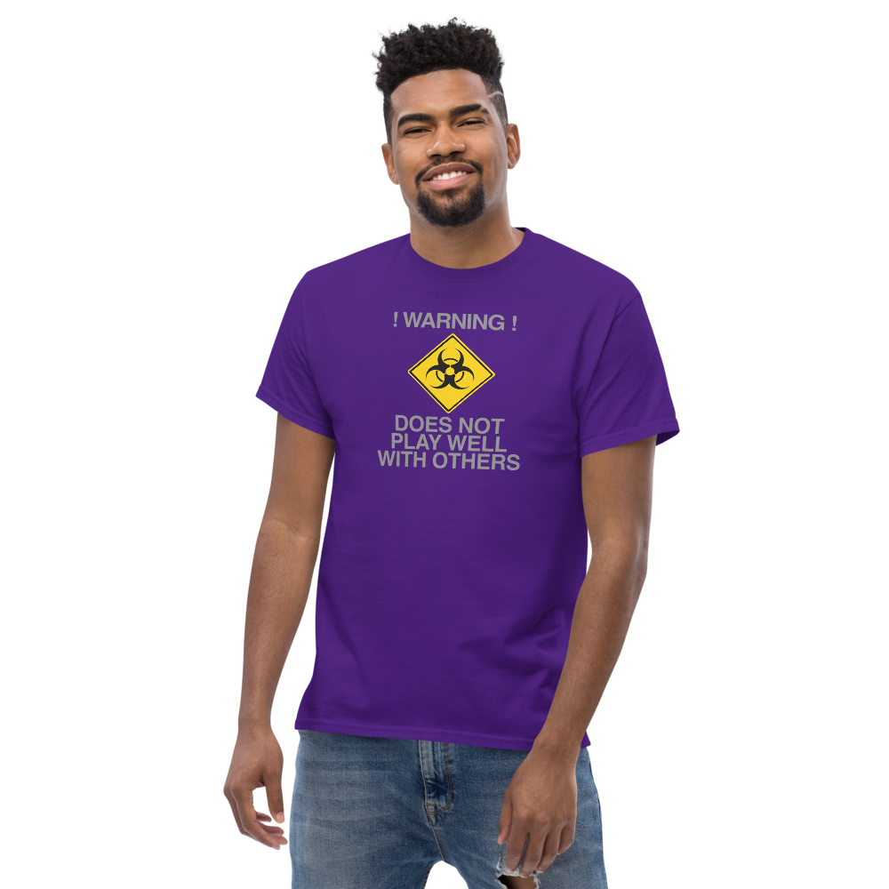 "!Warning! Does Not Play Well With Others" printed on a purple unisex classic tee worn by a male