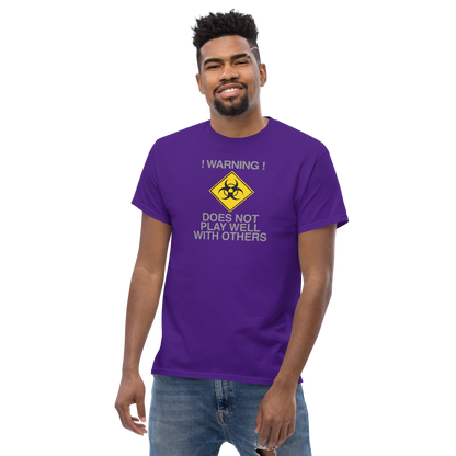 "!Warning! Does Not Play Well With Others" printed on a purple unisex classic tee worn by a male