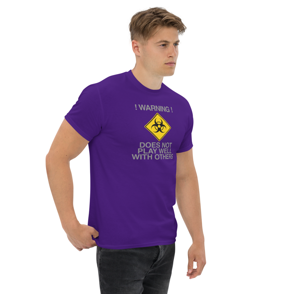 "!Warning! Does Not Play Well With Others" printed on a purple unisex classic tee worn by a male