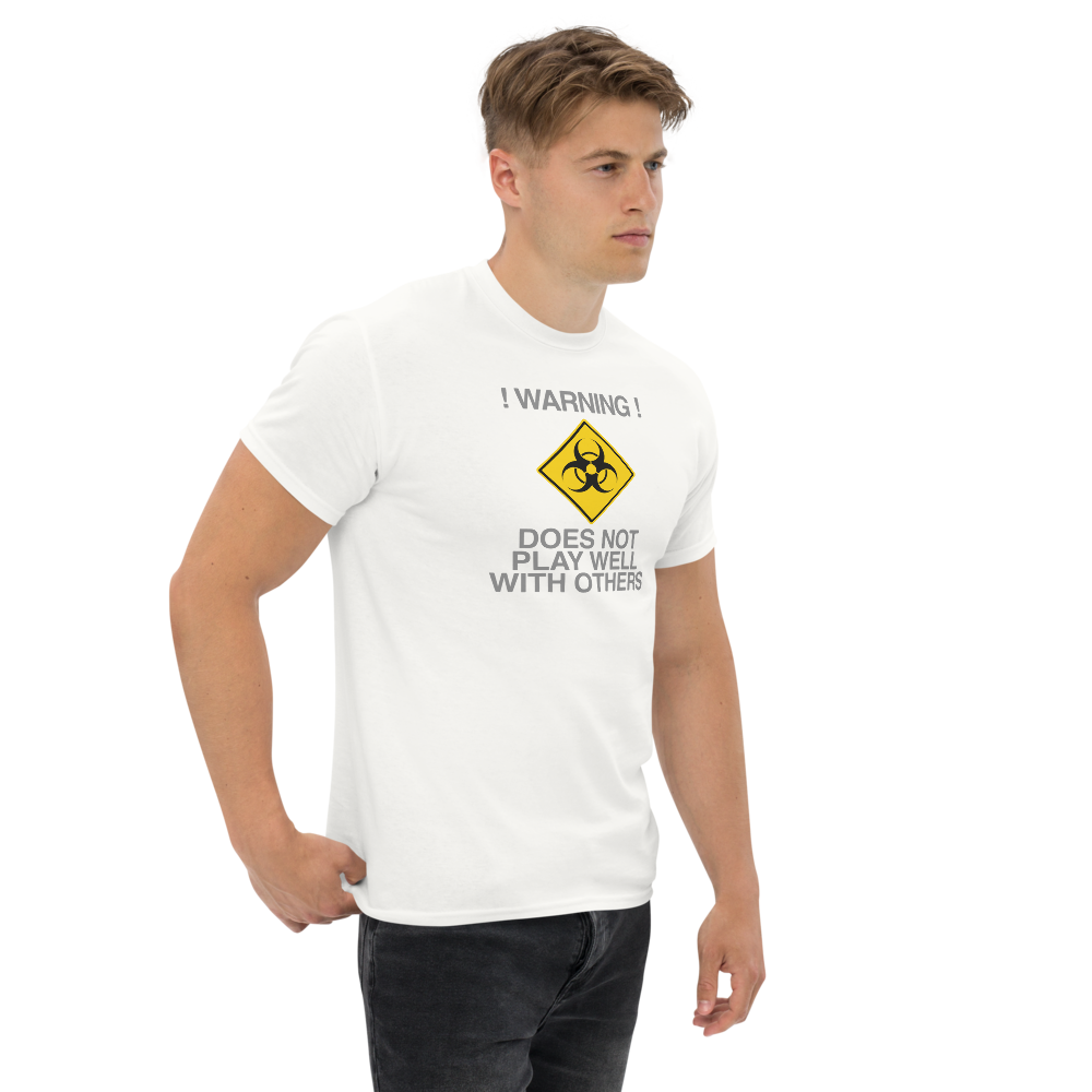 "!Warning! Does Not Play Well With Others" printed on a white unisex classic tee worn by a male