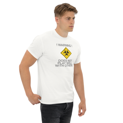 "!Warning! Does Not Play Well With Others" printed on a white unisex classic tee worn by a male