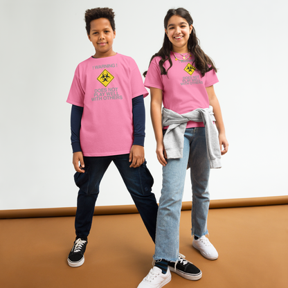 "!Warning! Does Not Play Well With Others" printed on a azalea youth classic tee worn by a female and male