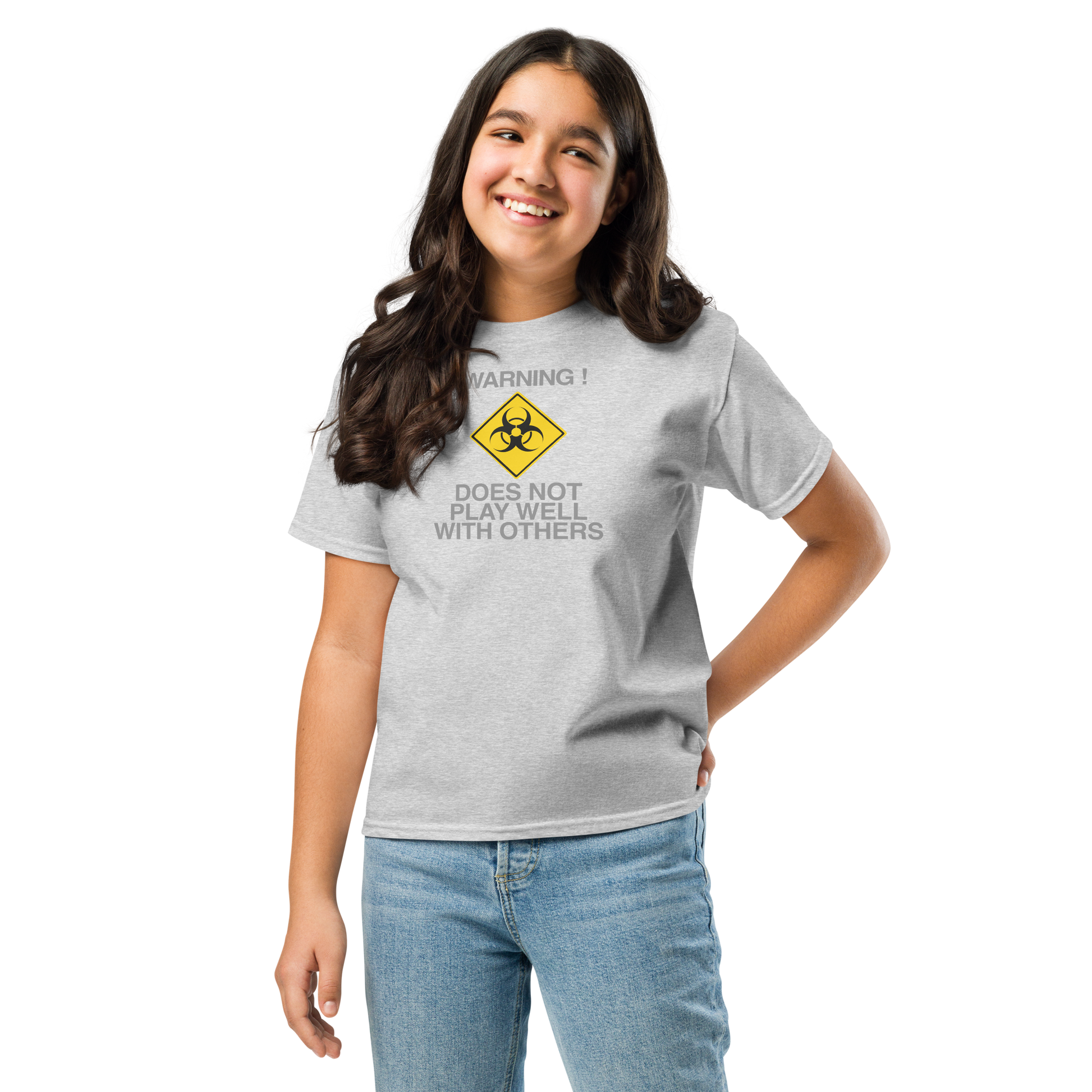 "!Warning! Does Not Play Well With Others" printed on a sport grey youth classic tee worn by a female