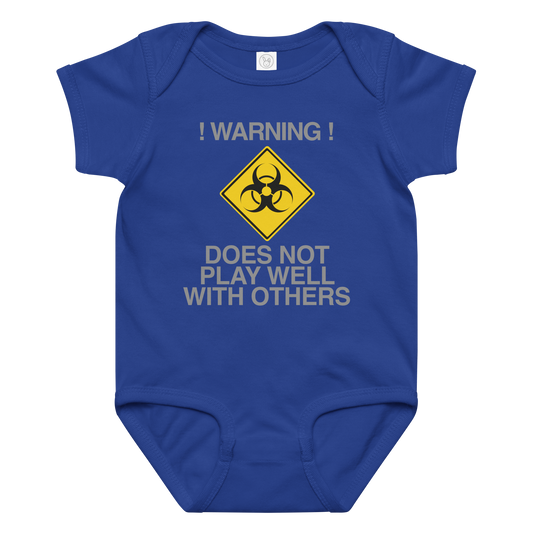 "!Warning! Does Not Play Well With Others" printed on a royal baby jersey bodysuit laying on a flat surface amongst other clothes