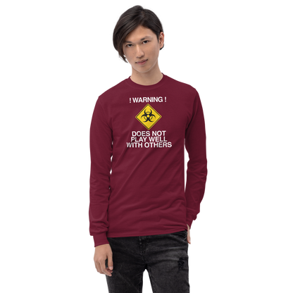 "!Warning! Does Not Play Well With Others" printed on a maroon men's long sleeve shirt worn by a male
