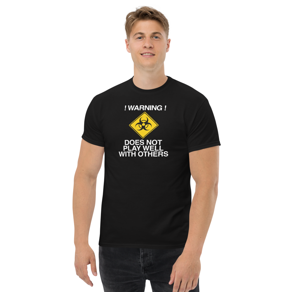 "!Warning! Does Not Play Well With Others" printed on a black unisex classic tee worn by a male