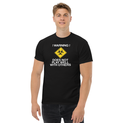 "!Warning! Does Not Play Well With Others" printed on a black unisex classic tee worn by a male