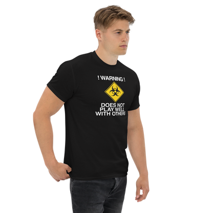 "!Warning! Does Not Play Well With Others" printed on a black unisex classic tee worn by a male