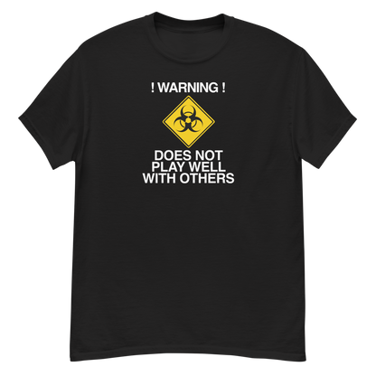 "!Warning! Does Not Play Well With Others" printed on a black unisex classic tee laying on a flat surface