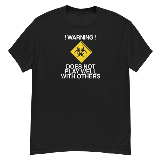 "!Warning! Does Not Play Well With Others" printed on a black unisex classic tee laying on a flat surface