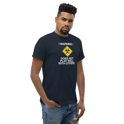"!Warning! Does Not Play Well With Others" printed on a navy unisex classic tee worn by a male