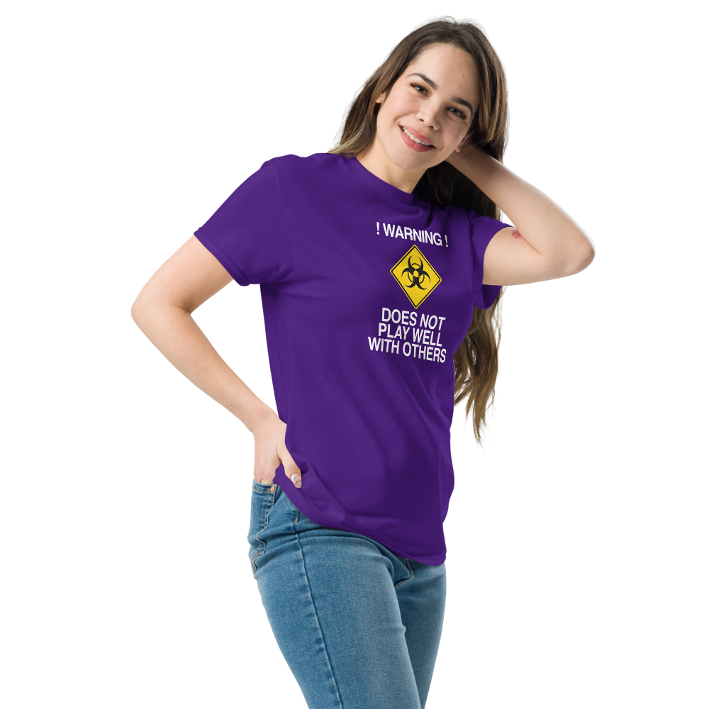 "!Warning! Does Not Play Well With Others" printed on a purple unisex classic tee worn by a female