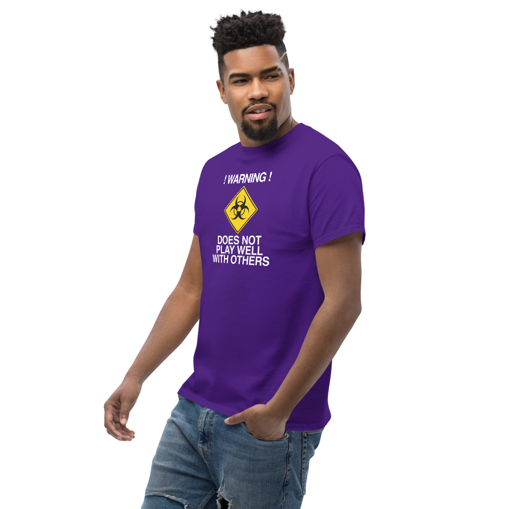 "!Warning! Does Not Play Well With Others" printed on a purple unisex classic tee worn by a male