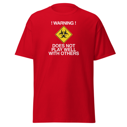 "!Warning! Does Not Play Well With Others" printed on a red on an invisible body
