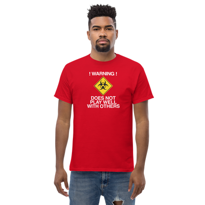 "!Warning! Does Not Play Well With Others" printed on a red unisex classic tee worn by a male