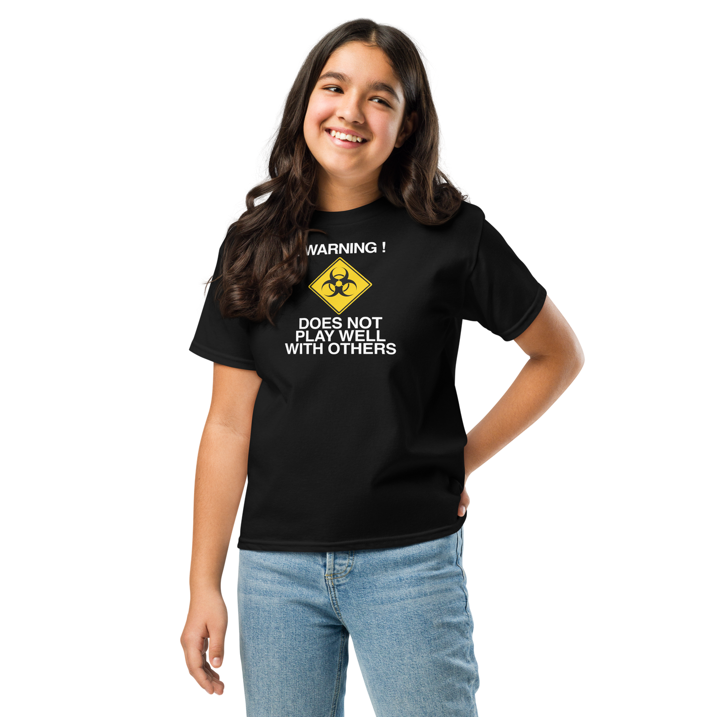 "!Warning! Does Not Play Well With Others" printed on a black youth classic tee worn by a female