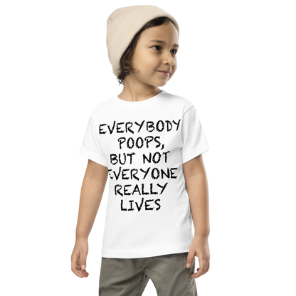 "Everybody poops, but not everyone really lives" printed on a white toddler short sleeve tee worn by a male wearing a cap