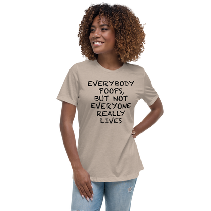 "Everybody poops, but not everyone really lives" printed on a heather stone women's relaxed t-shirt worn by a female
