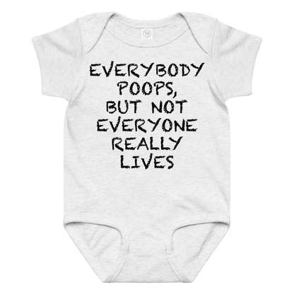 "Everybody poops, but not everyone really lives" printed on a ash baby jersey bodysuit laying on a flat surface amongst other clothes