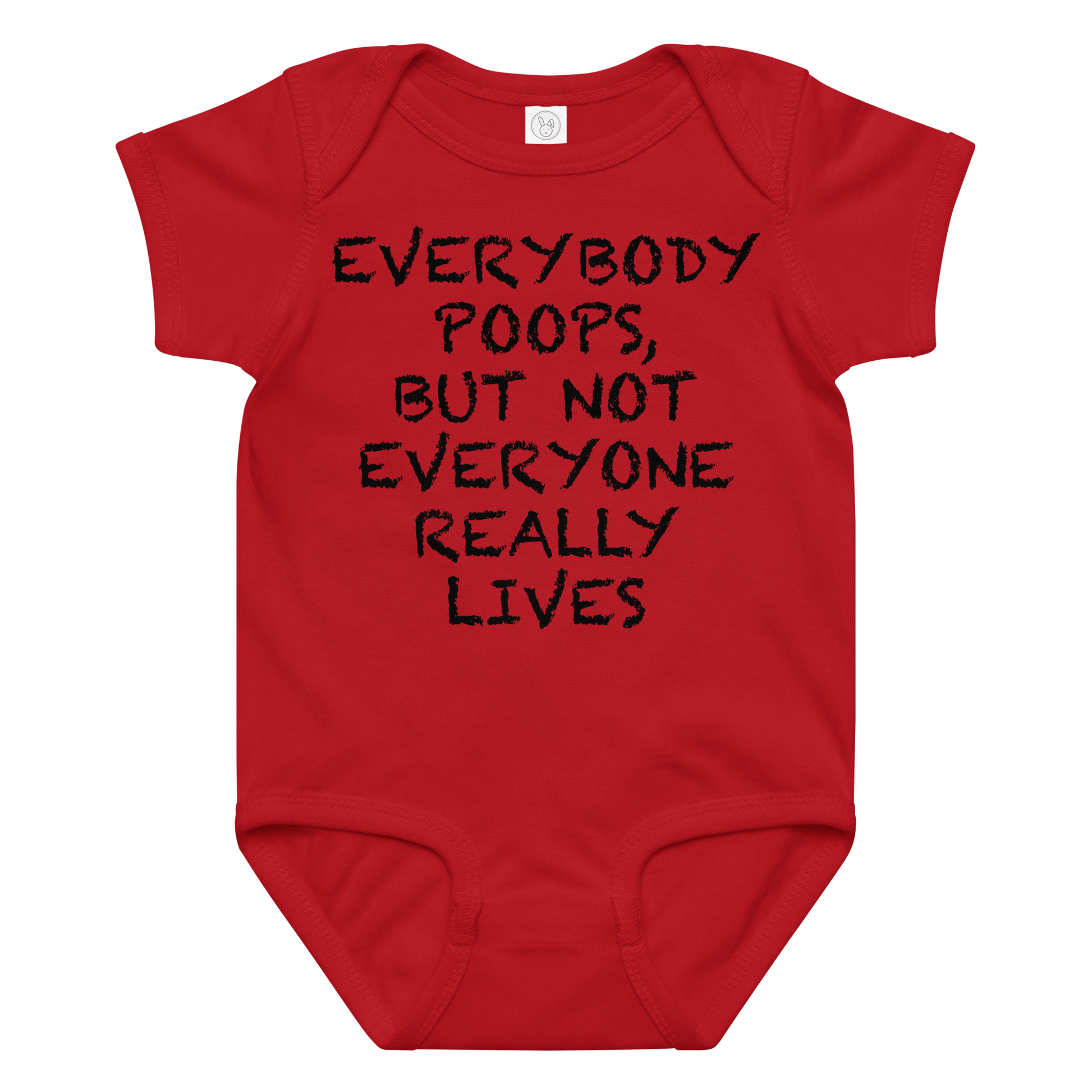 "Everybody poops, but not everyone really lives" printed on a red baby jersey bodysuit laying on a flat surface amongst other clothes