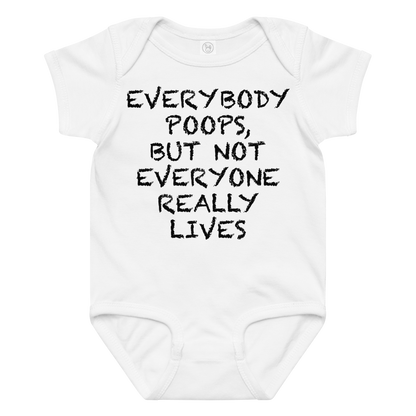 "Everybody poops, but not everyone really lives" printed on a white baby jersey bodysuit laying on a flat surface amongst other clothes
