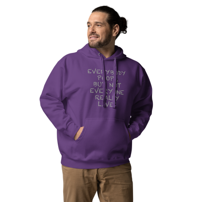 "Everybody poops, but not everyone really lives" printed on a purple unisex hoodie worn by a male