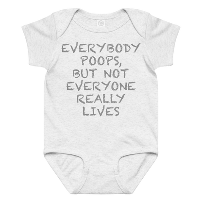 "Everybody poops, but not everyone really lives" printed on a ash baby jersey bodysuit laying on a flat surface amongst other clothes
