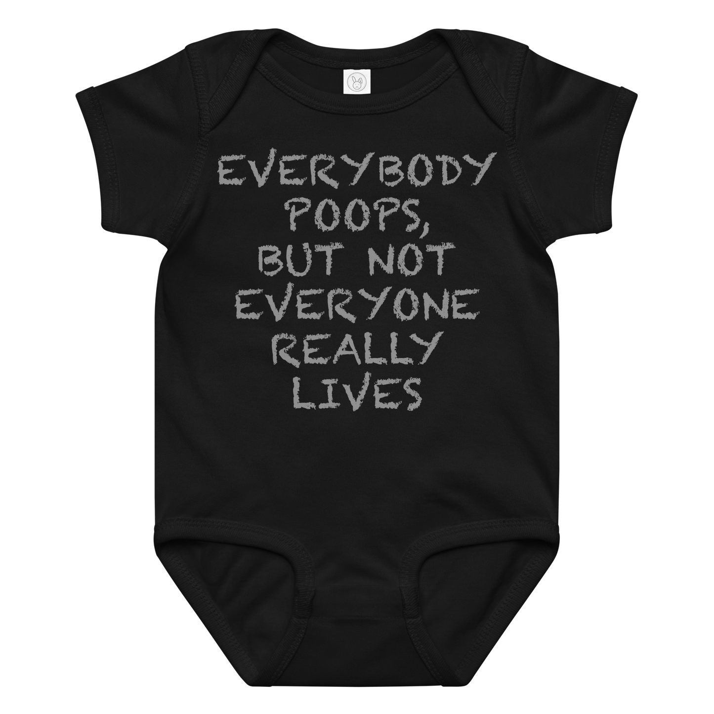 "Everybody poops, but not everyone really lives" printed on a black baby jersey bodysuit laying on a flat surface amongst other clothes