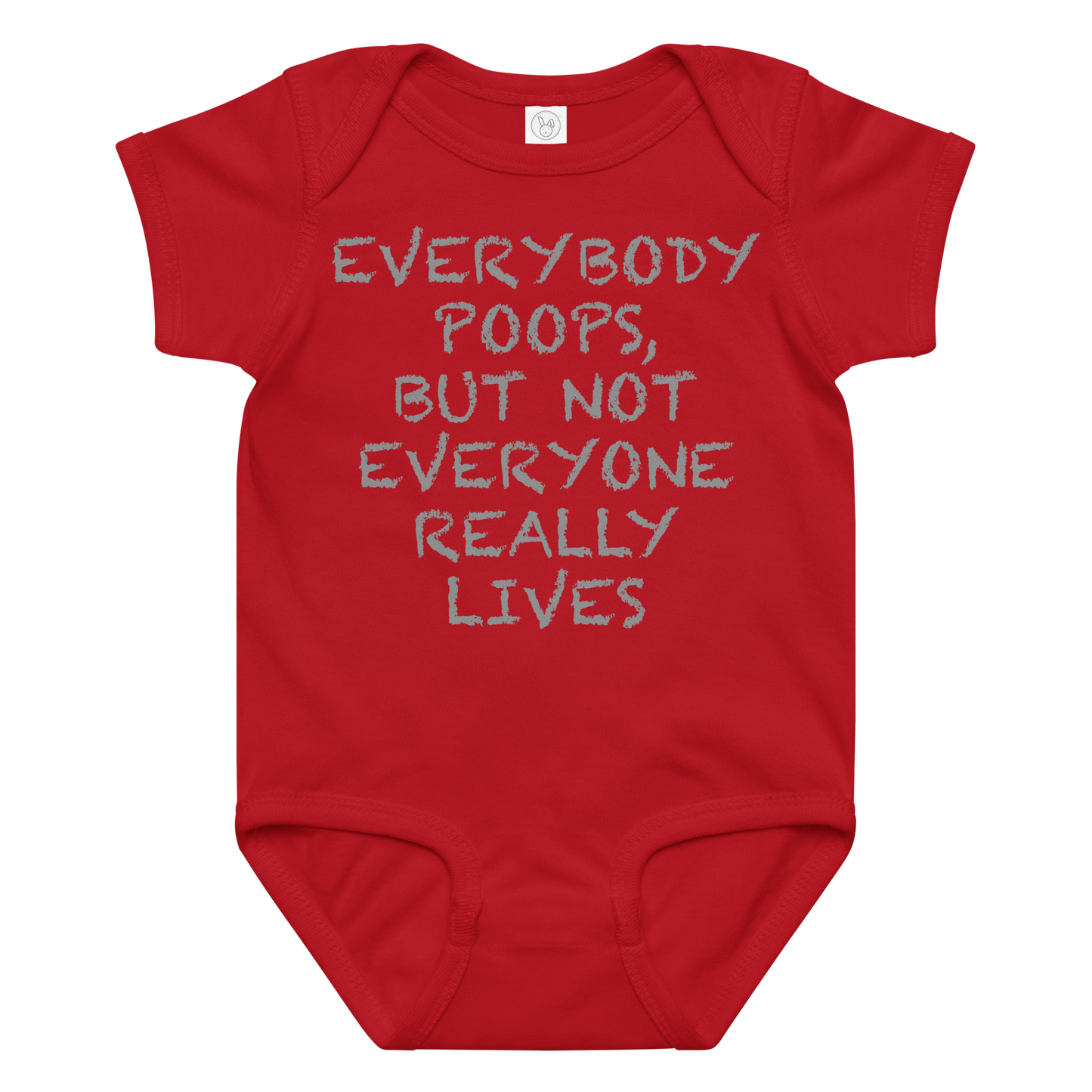 "Everybody poops, but not everyone really lives" printed on a red baby jersey bodysuit laying on a flat surface amongst other clothes