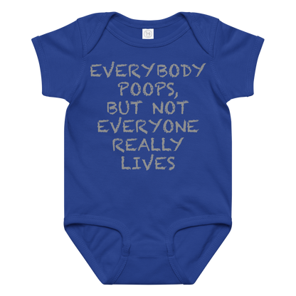 "Everybody poops, but not everyone really lives" printed on a royal baby jersey bodysuit laying on a flat surface amongst other clothes